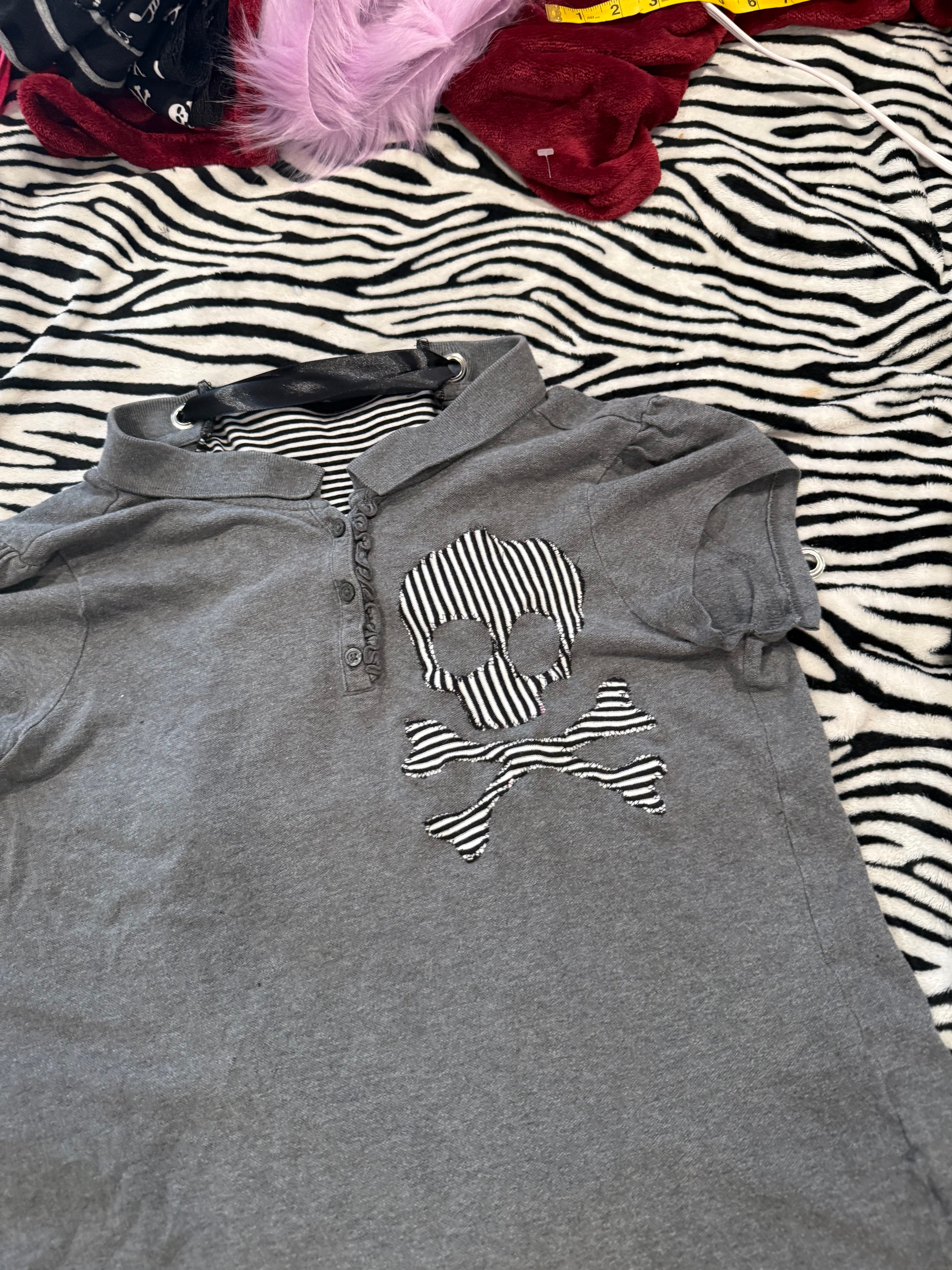 grey striped skull lace up polo size L