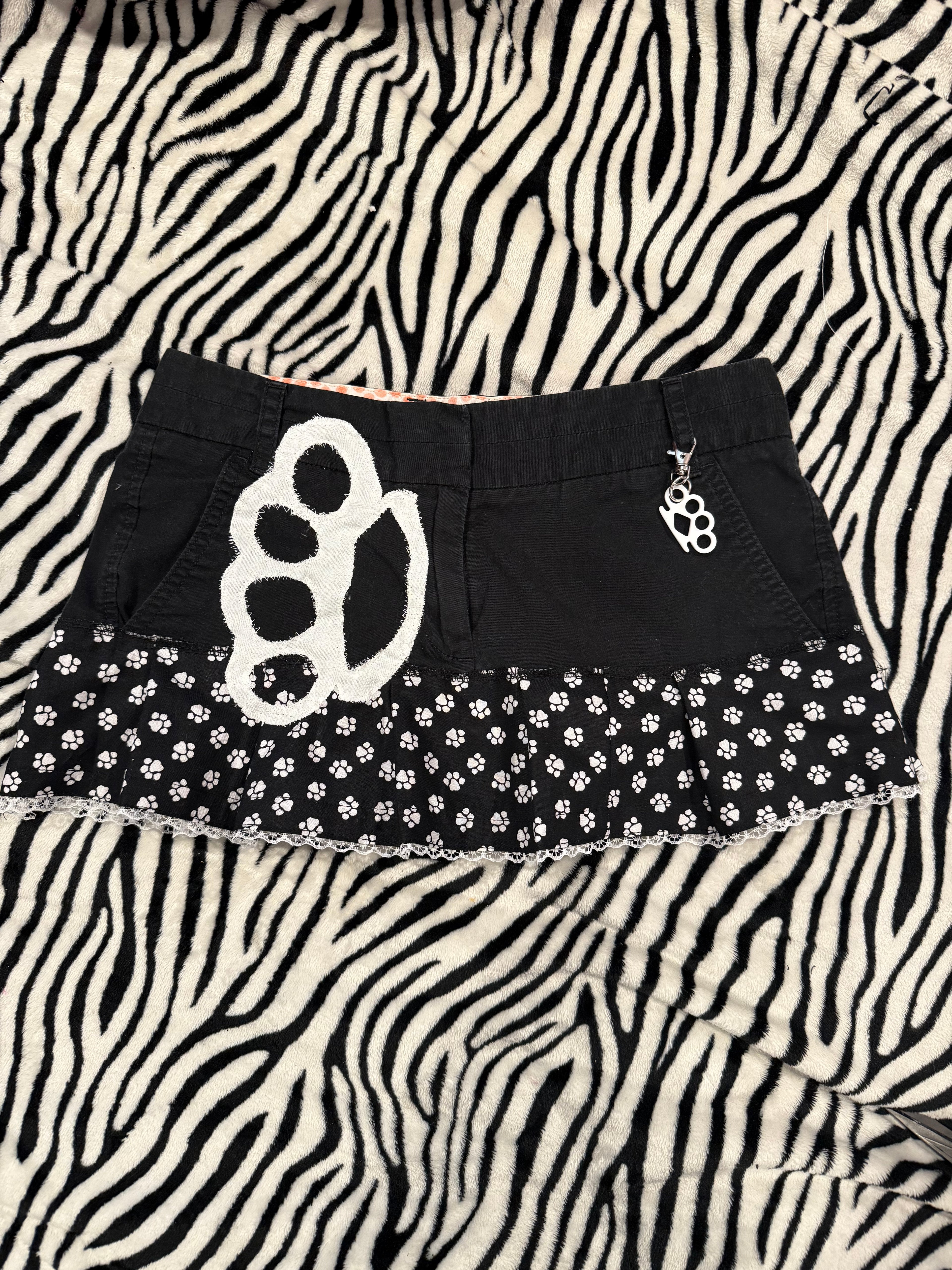 brass knuckle paw print skirt size xs/s