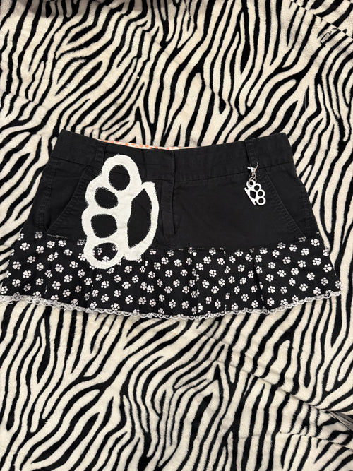 brass knuckle paw print skirt size xs/s