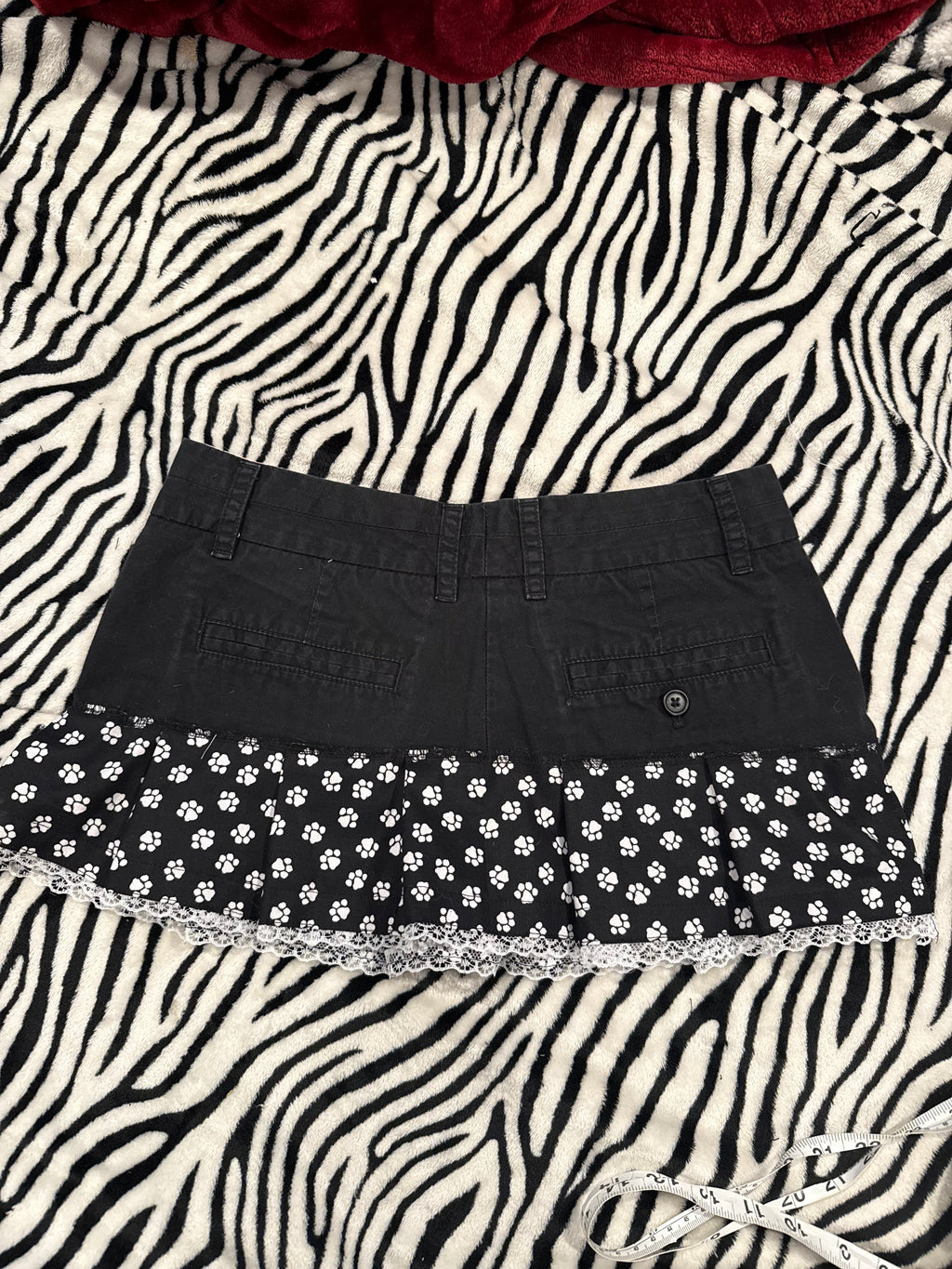 brass knuckle paw print skirt size xs/s
