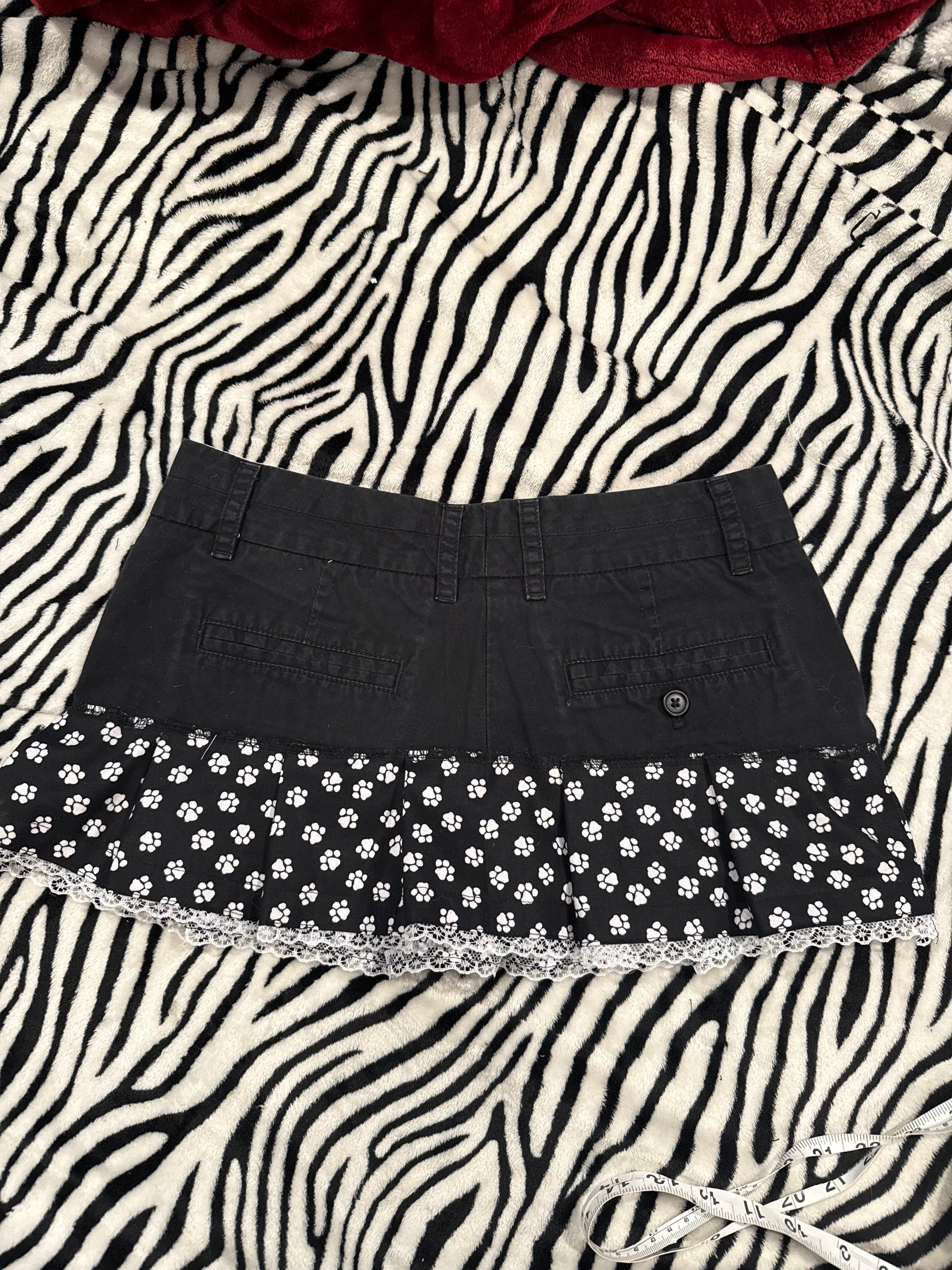 brass knuckle paw print skirt size xs/s