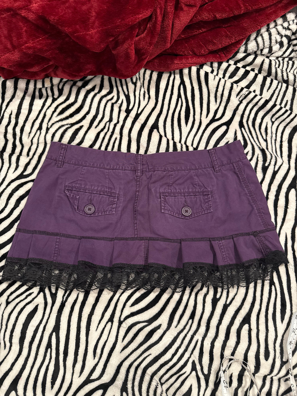 purple & black brass knuckle skirt size L