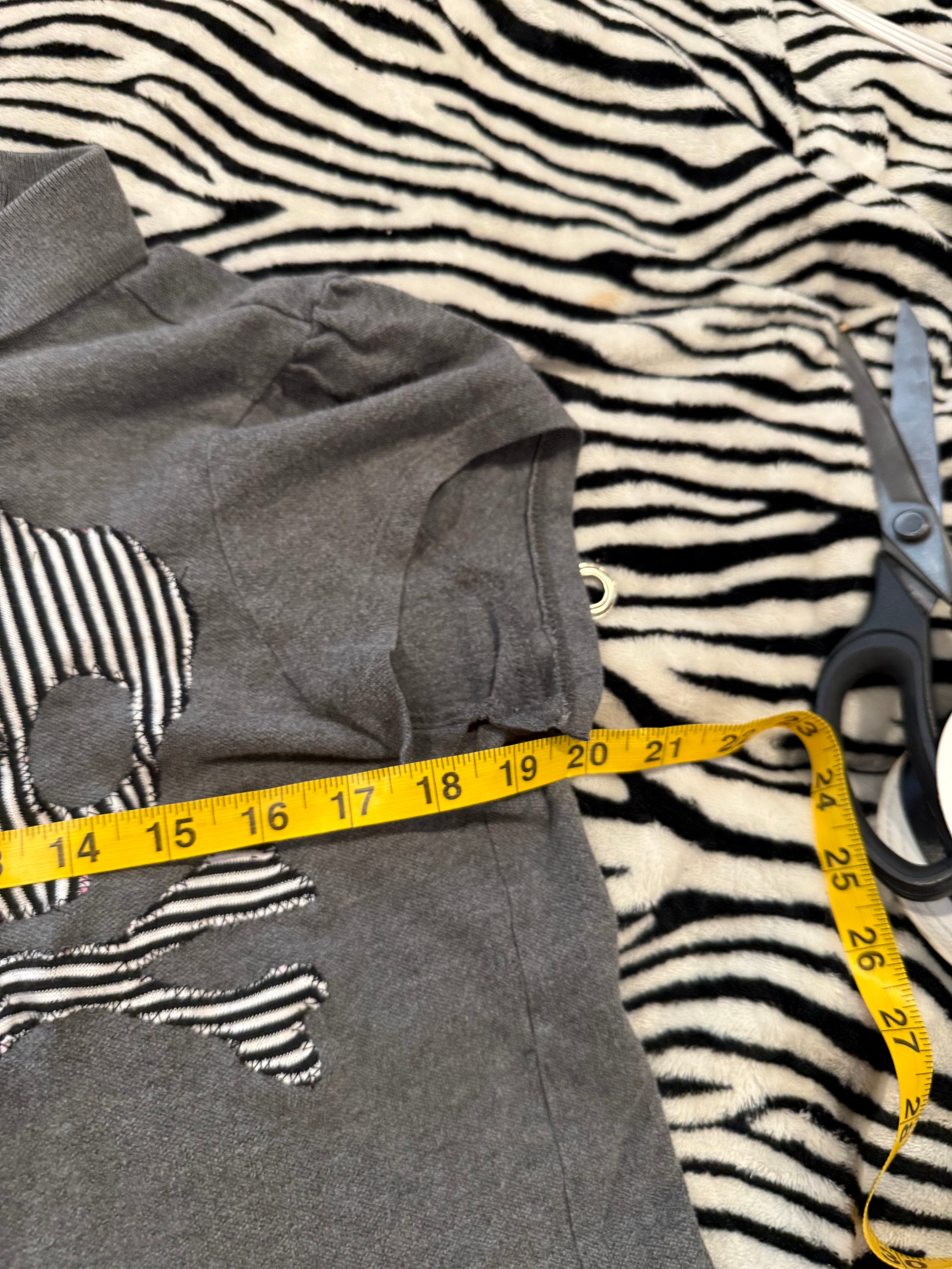 grey striped skull lace up polo size L